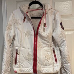 White Hooded Winter Jacket with Red Trim is reversible. Purchased in Switzerland